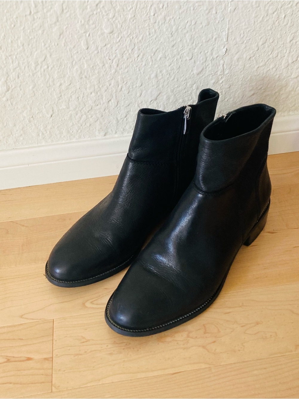 Black Leather Franco Sarto Booties with Silver Chain Detail